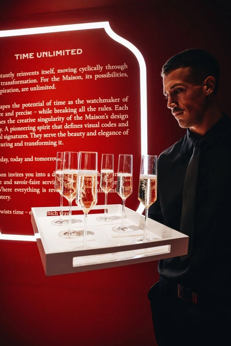 Illustrative luxury event activation with hospitality and a sculptural display