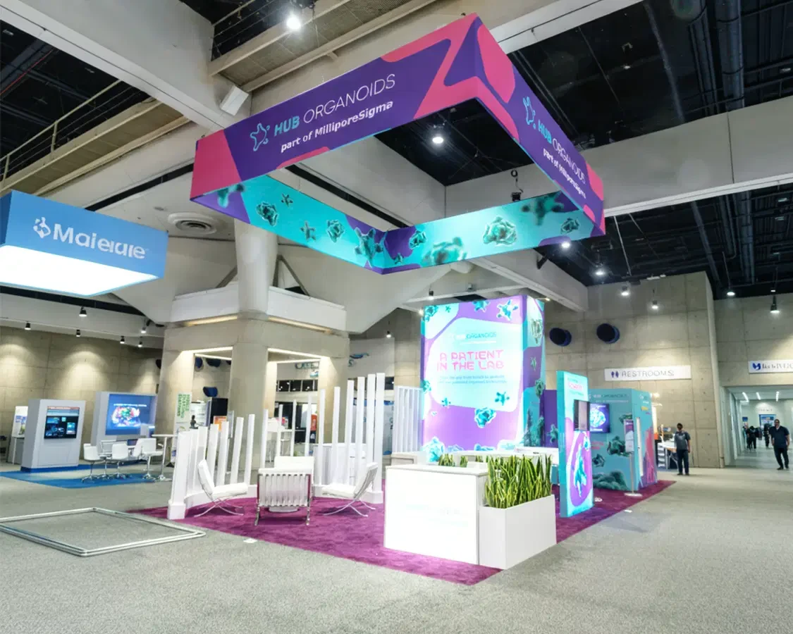 Illustrative healthcare and pharma booth activation at a conference