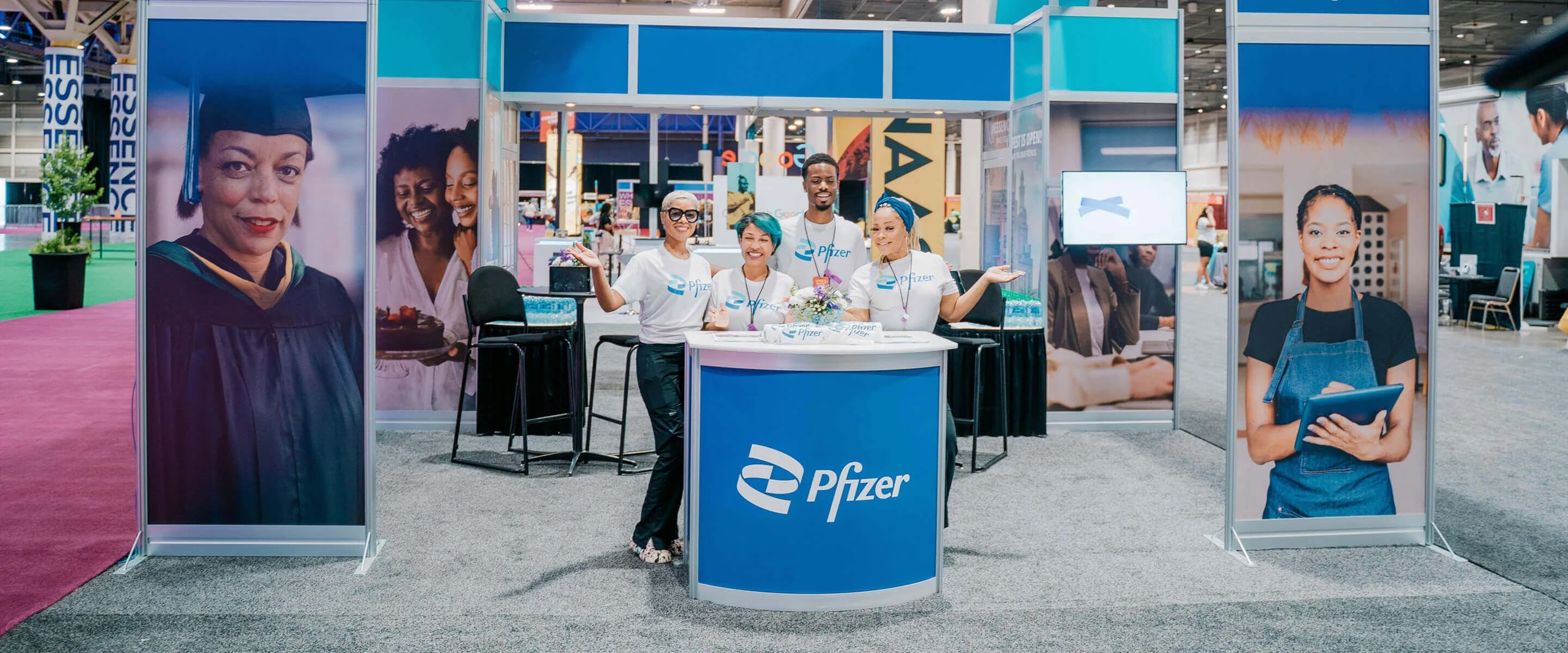Illustrative pharma conference activation booth with brand ambassadors