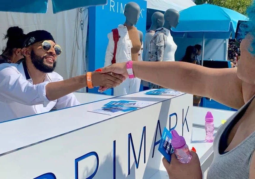 Illustrative fashion activation at an outdoor music festival